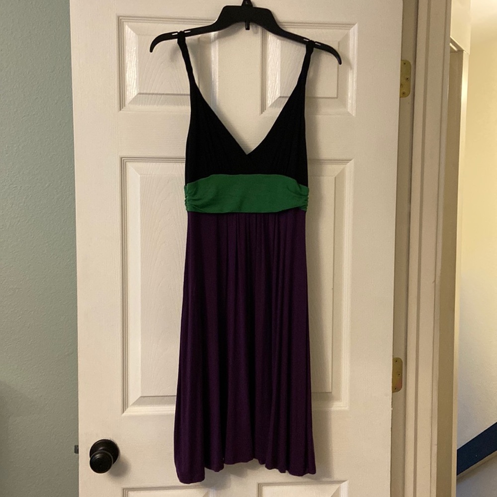 Sleeveless dress, worn once.  V neck and back.
